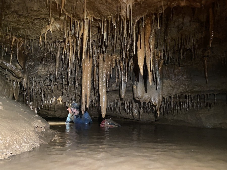 Darian ear-dipping in Whip Whistle Cave - 8/8/2021